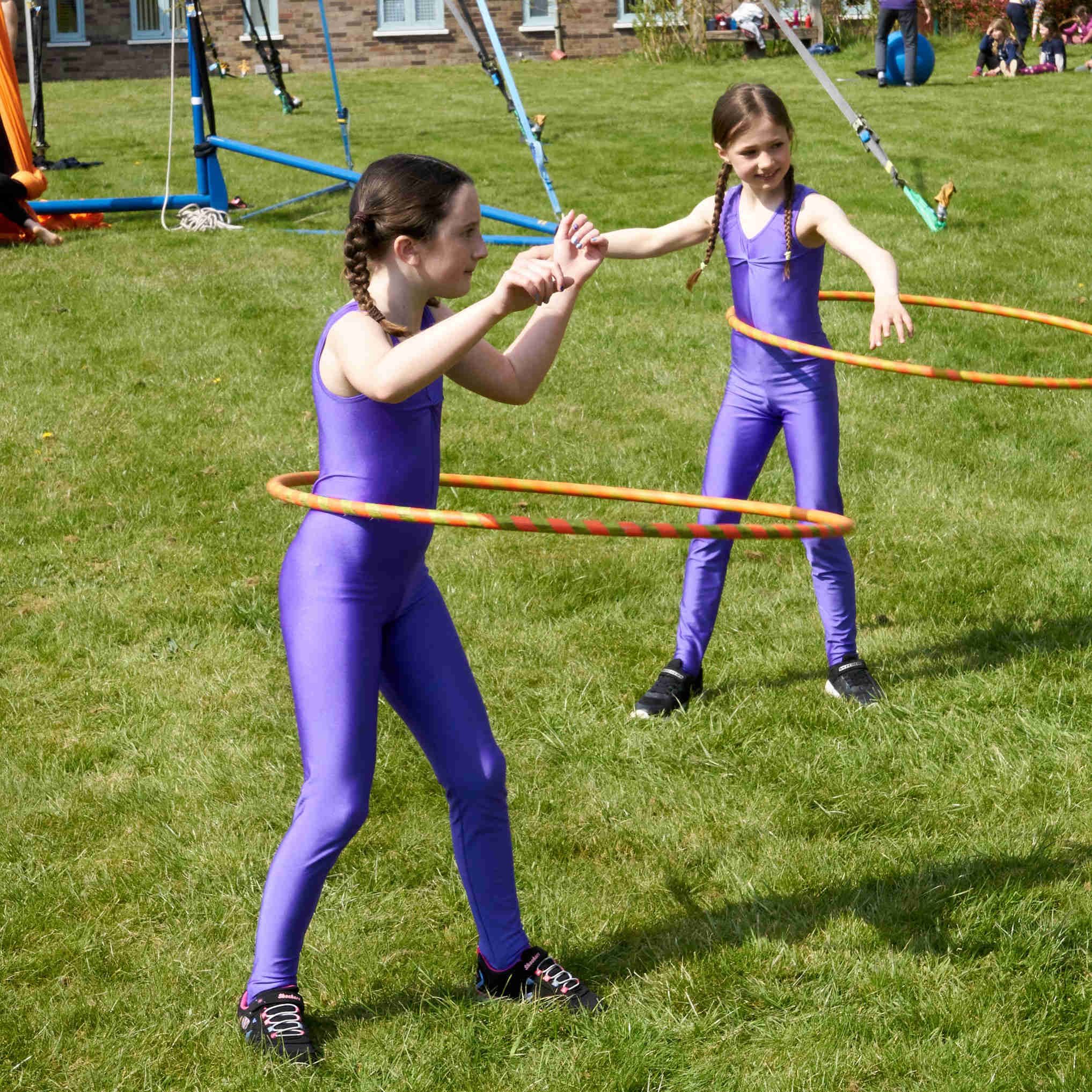 Youth Circus square hula hoop outdoors